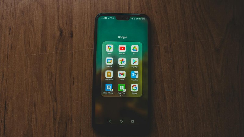 Vibrant design mockup of Aluminium OS showcasing abstract shapes and colors