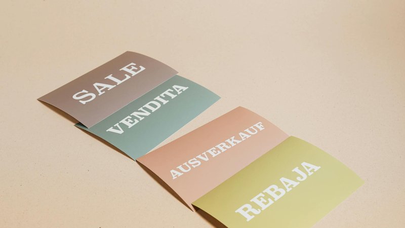 AmEx Platinum Card with Saks Fifth Avenue branding on a table