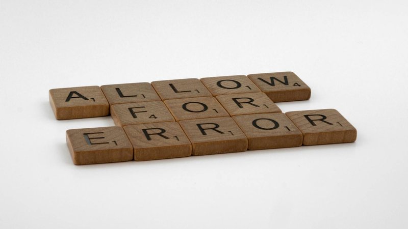 Ilhan Omar speaking at a political event, with a backdrop of Somaliland flags.