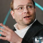 Agentic AI logo with bakery elements representing innovation in business