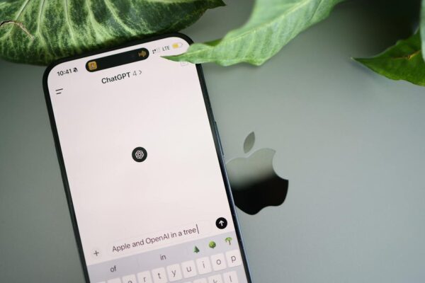 Apple logo with a backdrop of digital privacy symbols and chat bubbles