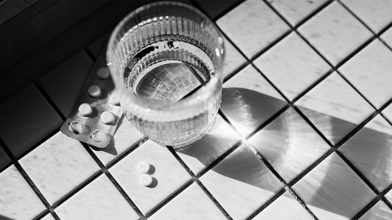 Aspirin and a glass of water