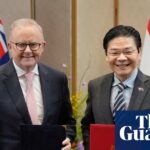 Australian and Singaporean leaders discussing energy security agreement