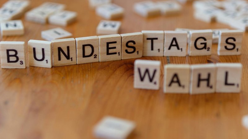 Angus Taylor speaking during a political address in Australia, highlighting key issues.