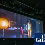 Researcher studying audience brain activity in a high-tech cinema at Bristol University