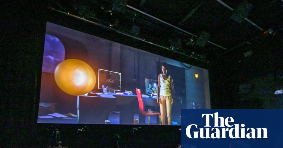 Researcher studying audience brain activity in a high-tech cinema at Bristol University