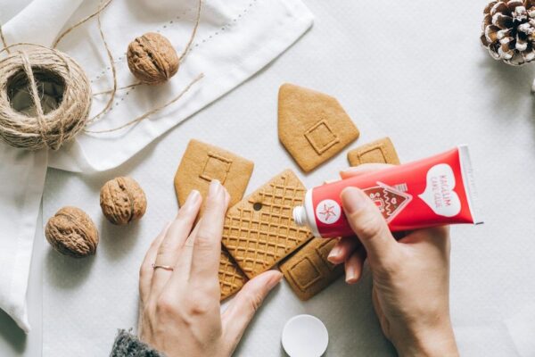 Students baking at Carleton College's renovated Cookie House, a cherished campus tradition.