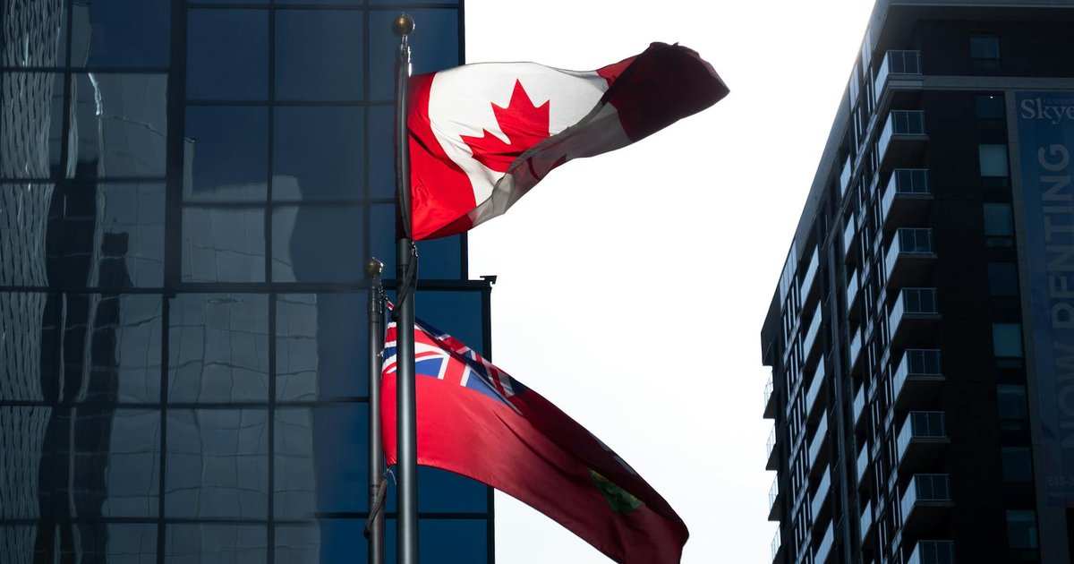 Carolina Hurricanes and Ottawa Senators players battling on the ice during a playoff game.