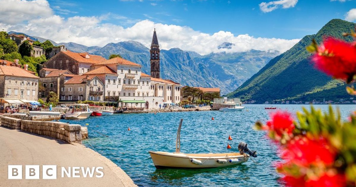 A scenic view of Croatia's coastline with a car ready for travel.