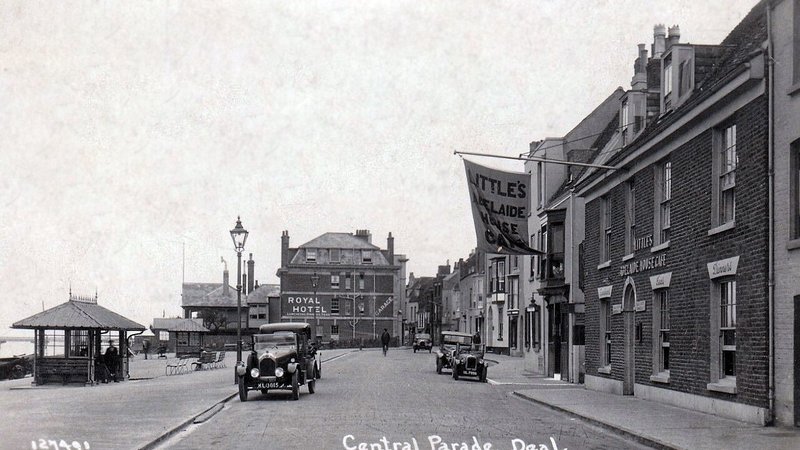 Costa Rica flag with a backdrop of migrants, symbolizing the deportee deal