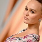 A young professional showcasing personal branding in a modern office setting