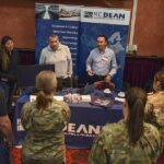 Google logo with AI technology graphics representing investment in AI