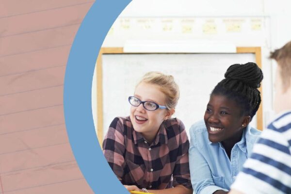 A diverse group of students engaging with educational technology in a classroom setting.