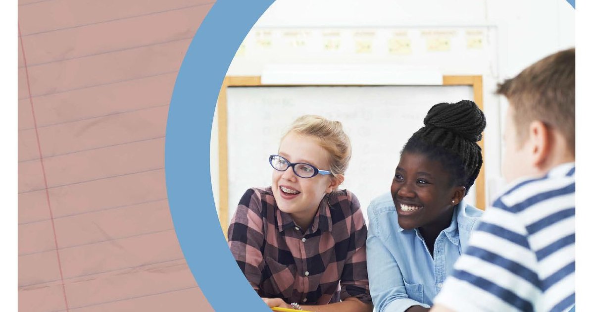 A diverse group of students engaging with educational technology in a classroom setting.