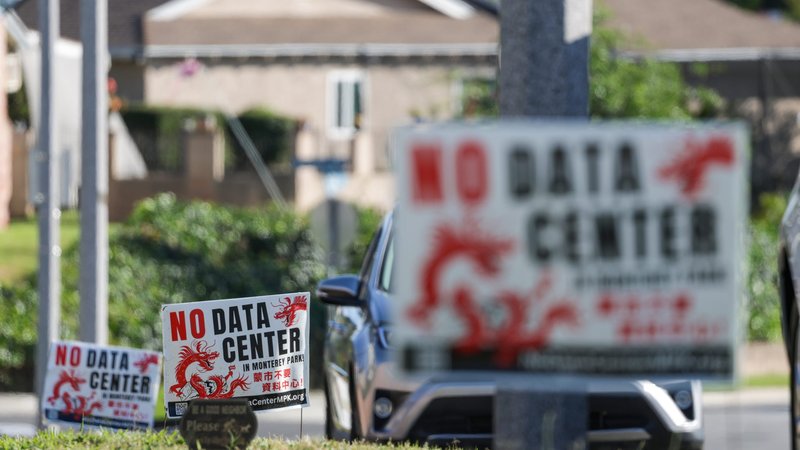 Signs opposing a proposed data center in Monterey Park, CA.