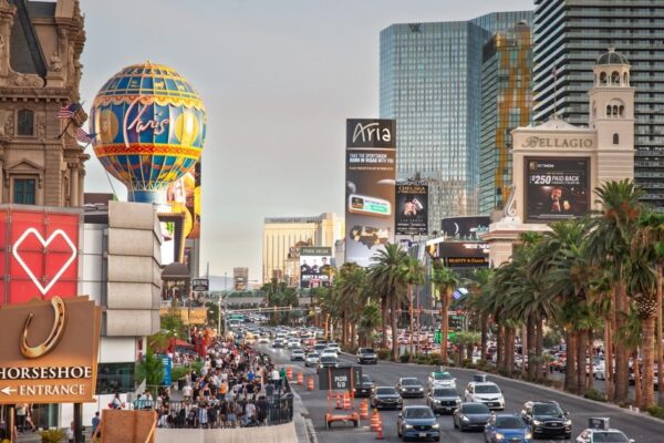 Vibrant Las Vegas Strip at night with neon lights and busy crowds