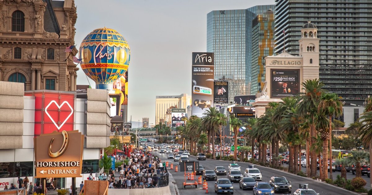 Vibrant Las Vegas Strip at night with neon lights and busy crowds