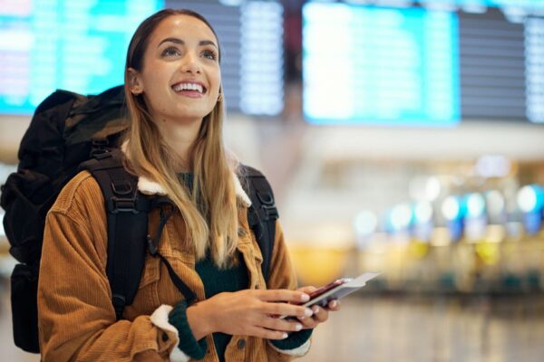 A traveler enjoying first-class travel with award points, showcasing luxury and comfort.