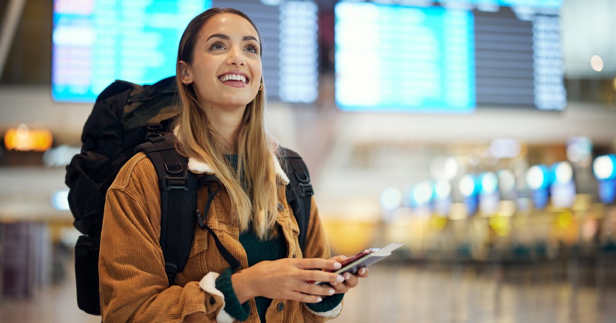 A traveler enjoying first-class travel with award points, showcasing luxury and comfort.