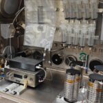 NASA astronaut preparing IV fluid for medical emergencies in space missions.