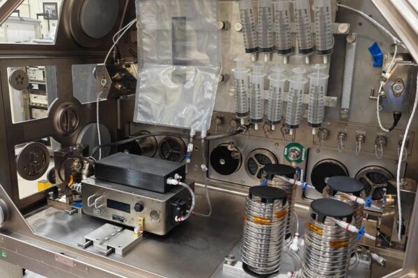 NASA astronaut preparing IV fluid for medical emergencies in space missions.