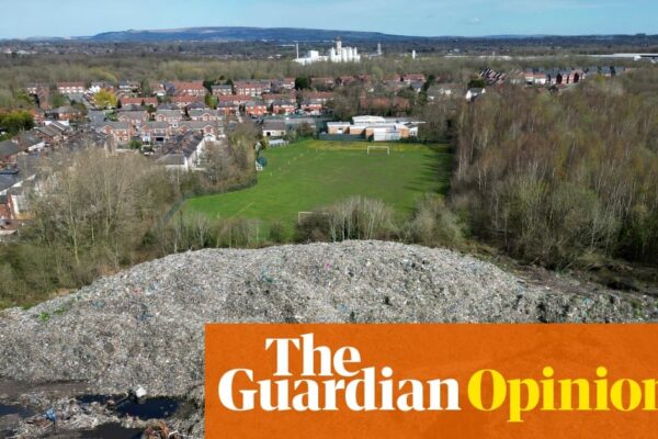 Aerial view of illegal waste dumping site, highlighting environmental damage.