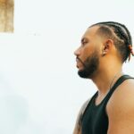 Ozuna, Dany Ome, and Kevincito El 13 in the music video for 'Paciente'