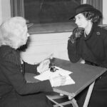 New York City skyline with financial graphs illustrating budget crisis