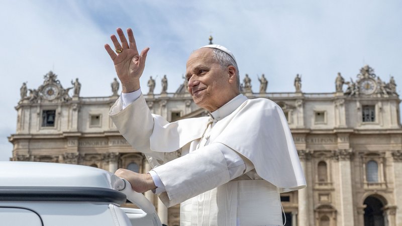 Pope Leo XIV waving to a crowd