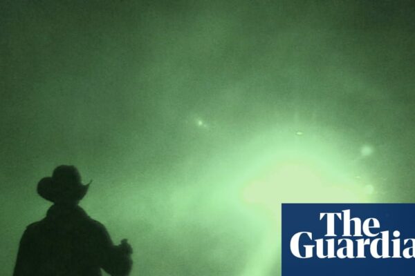 A mysterious UFO in the night sky, representing the intrigue of alien sightings.