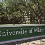 A marketing campaign in a subway station promoting charter schools and university enrollment.